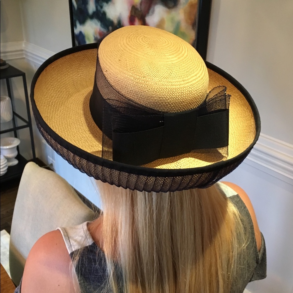 Navy and natural ladies straw hat.